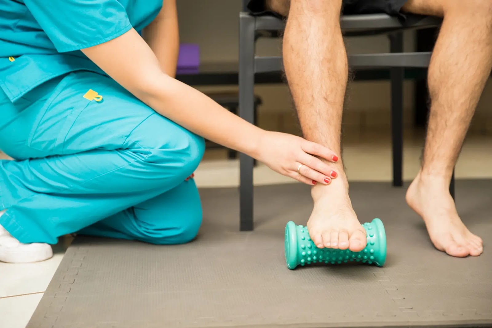 Foot therapy exercise with a podiatrist assisting, focused on plantar fasciitis treatment and heel pain relief